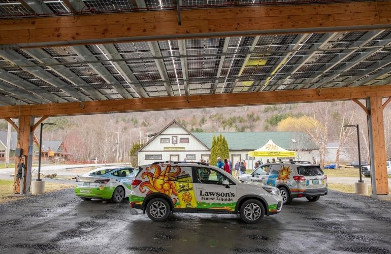 SunCommon completed Vermont's largest solar canopy for craft brewery Lawson's Finest Liquids in April 2022. The new canopy in Waitsfield complements the existing rooftop solar system and independent wastewater management system. Both solar installations will now offset about 60% of the brewery’s electric bill.