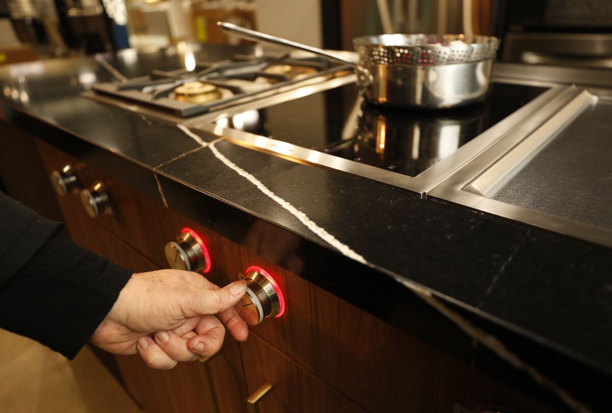 Chef Bridget Bueche, one of a growing group of evangelists for induction cooking, demonstrates in a showroom in Van Nuys.