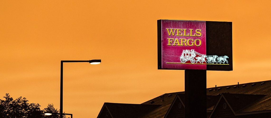 1024px-Wells_Fargo_Bank_Sign_Sunset_28052532561.jpg