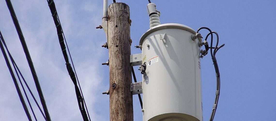 2023-08-17_14_11_50_Transformer_near_the_top_of_utility_pole_65401EW_along_Aquetong_Lane_in_the_Mountainview_section_of_Ewing_Township_Mercer_County_New_Jersey.jpg