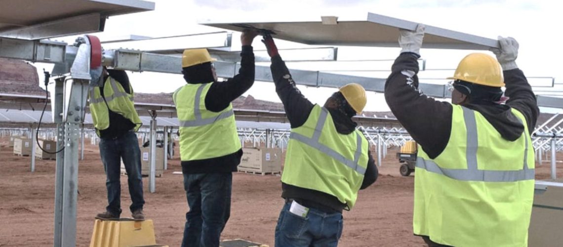 Navajo-Tribal-Utility-Authority-solar-installation-four-workers-1200x554.jpg