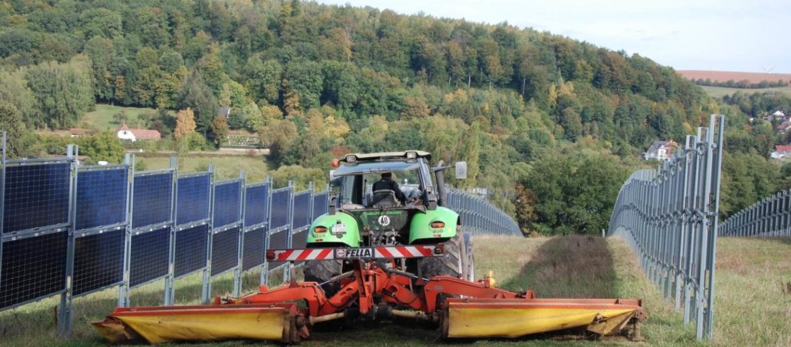 Tractor-during-mowing-work-in-the-solar-park-1200x803.jpeg